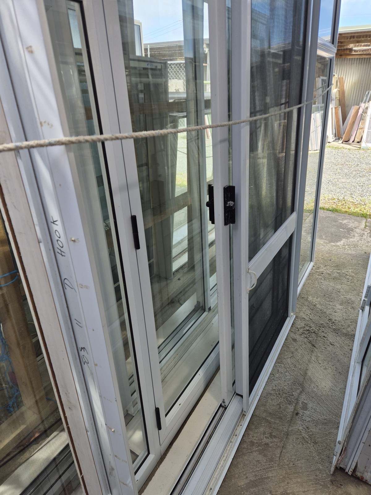 White Ranchslider with an opening window & flyscreen 2 H x 2.4W #2524