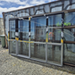 Grey Ranchslider 1960 H x 2900 W with 2 opening windows #2526