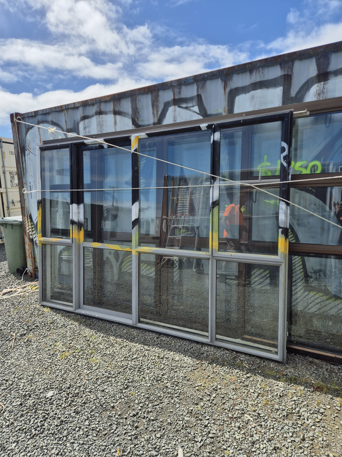 Grey Ranchslider 1960 H x 2900 W with 2 opening windows #2526