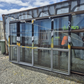 Grey Ranchslider 1960 H x 2900 W with 2 opening windows #2526