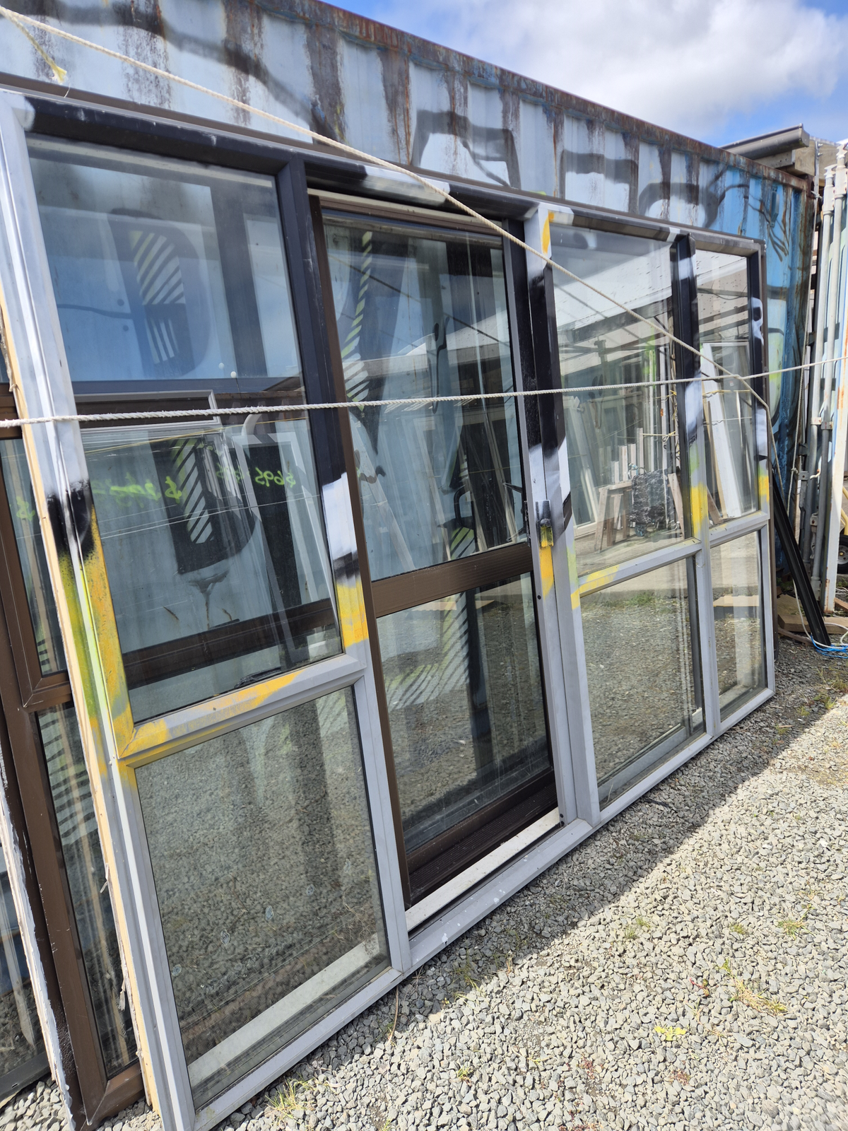 Grey Ranchslider 1960 H x 2900 W with 2 opening windows #2526