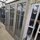 Lichen Green Double Glazed Bifolding Door #2541 see matching joinery