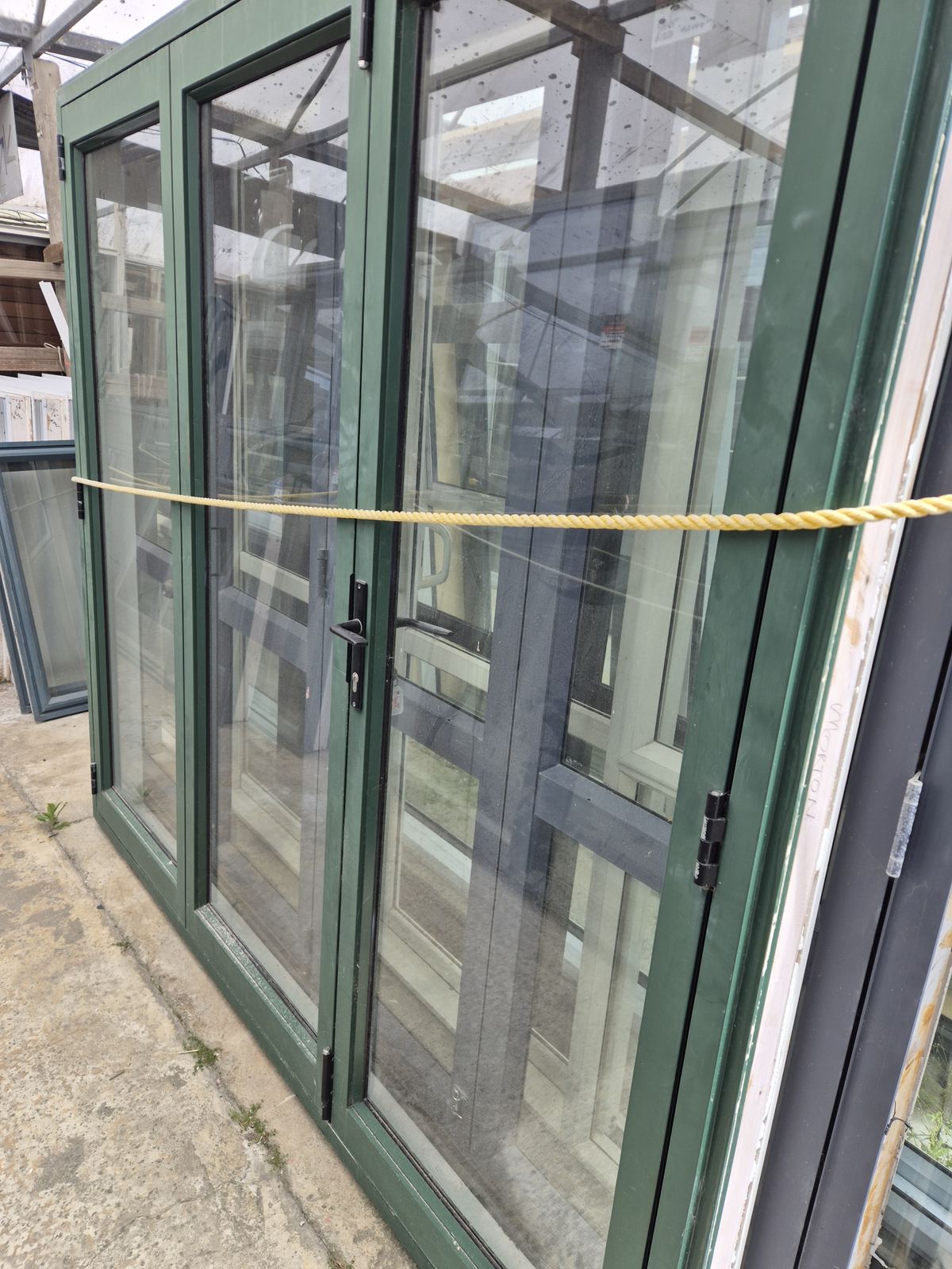Permanent Green Bifold Door with outside entry 2 H x 2.2 W #2563
