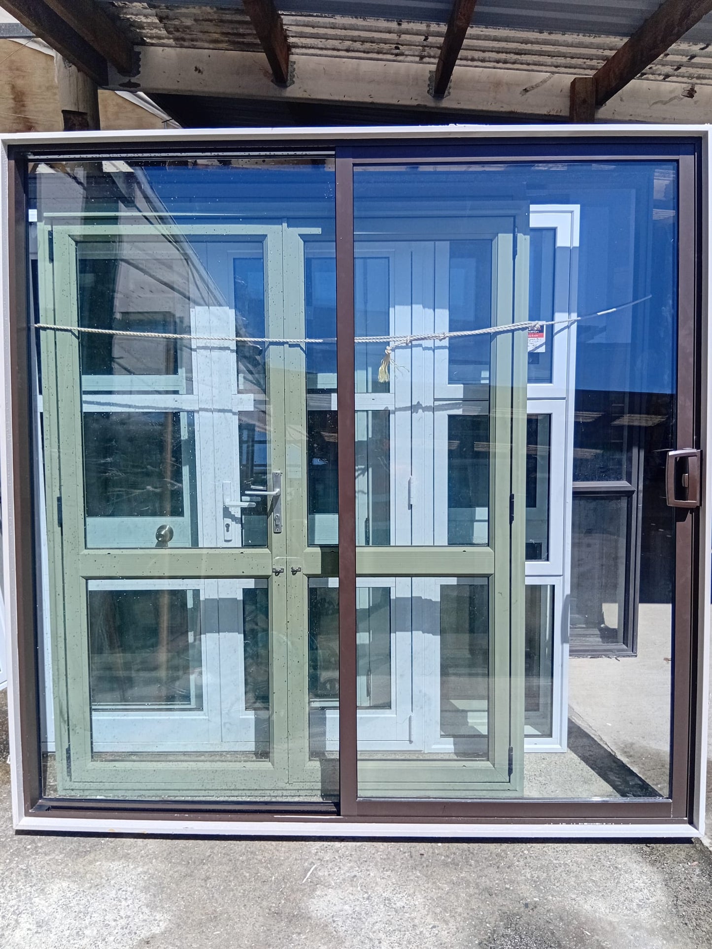 House lot of Near New Double Glazed Joinery Stacker sliders etc