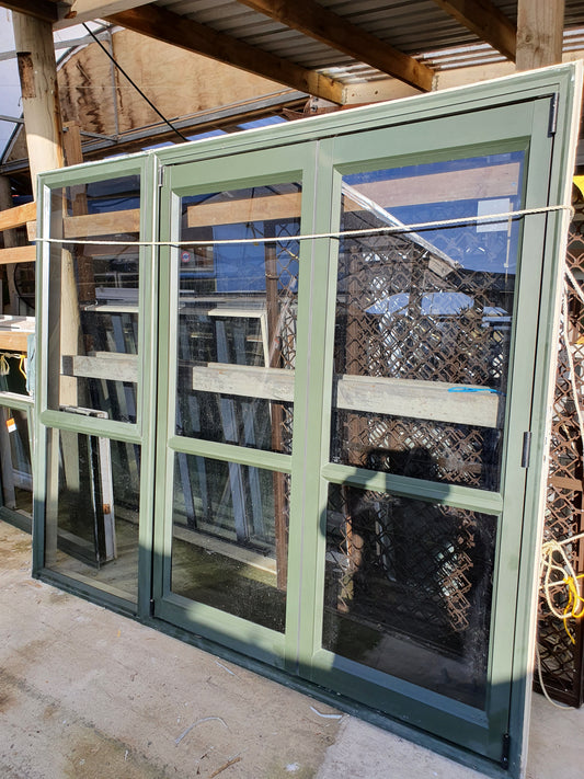 Karaka Green Bifolding Door with Opening Window 2 m H x 2.4 m W #BDC1